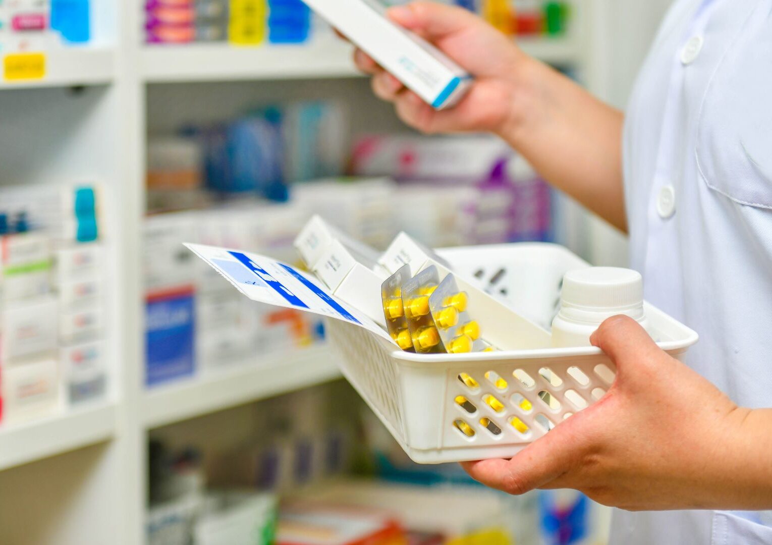 Pharmacist looking at kidney disease medication